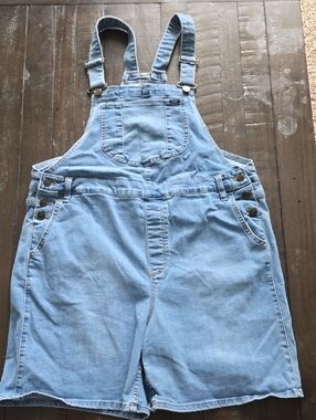 Lee light blue denim overalls with yellow logo tag